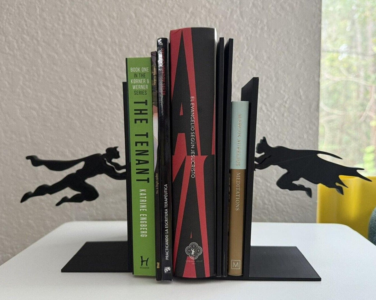 Ezeli Rakipler Karşı Karşıya Kitap Tutucu
